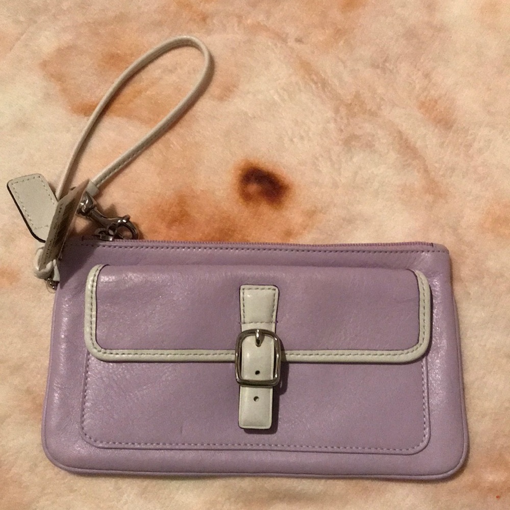 Lilac and White Coach wristlet.